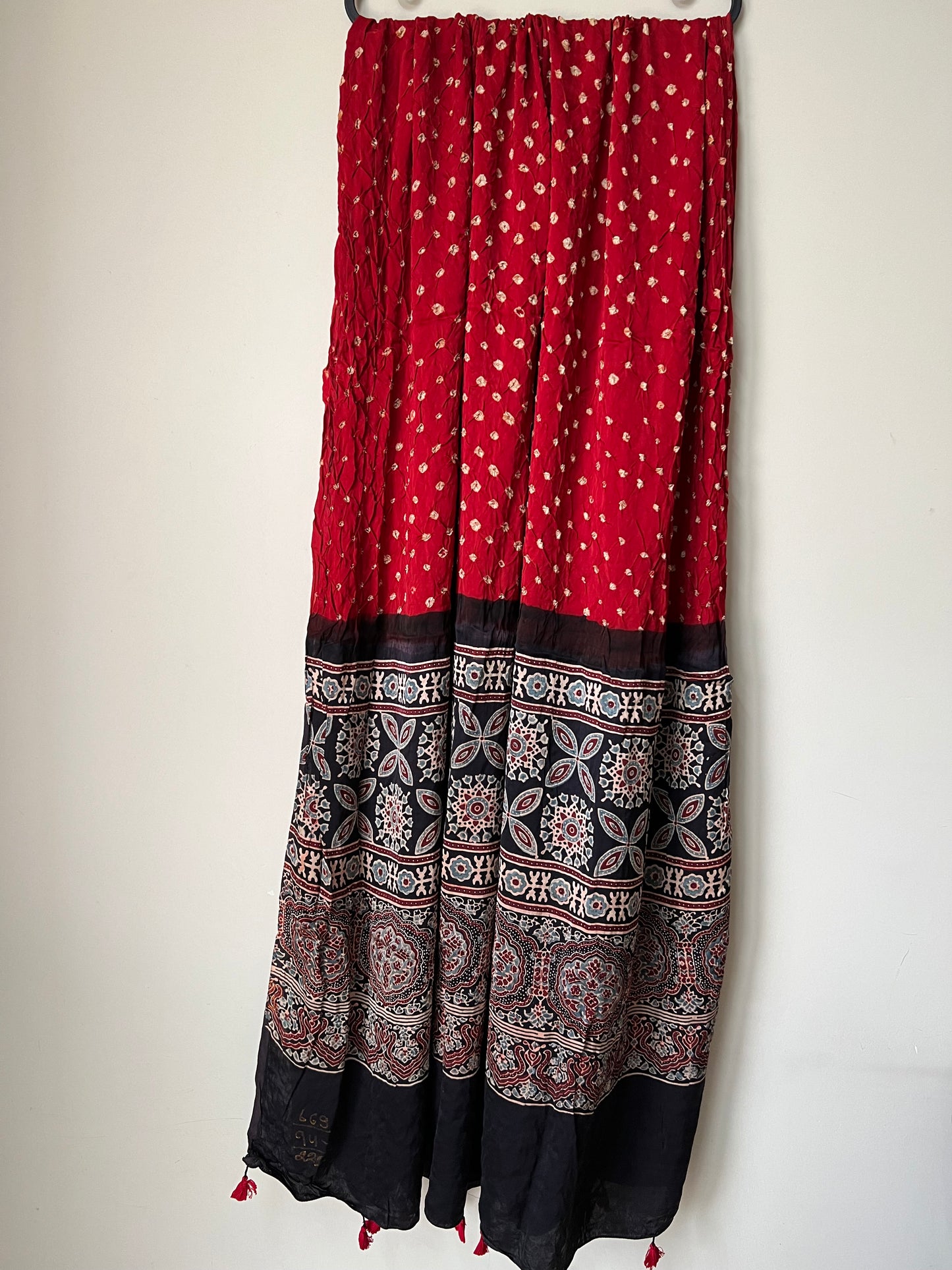 Red bandhani with black ajrakh silk dupatta