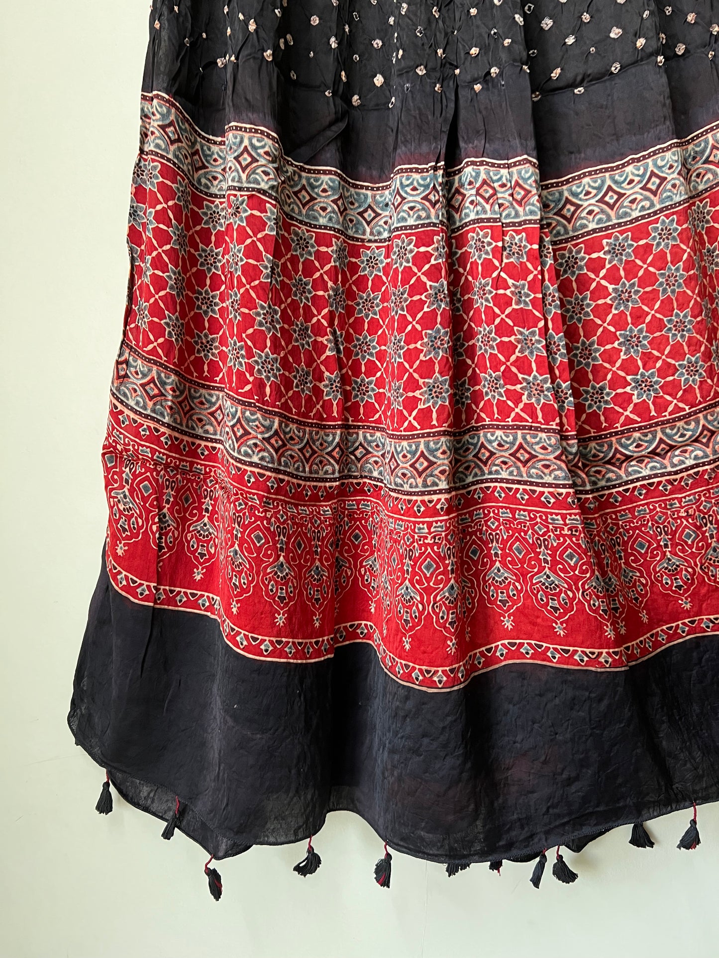 Black bandhani with red ajrakh silk dupatta