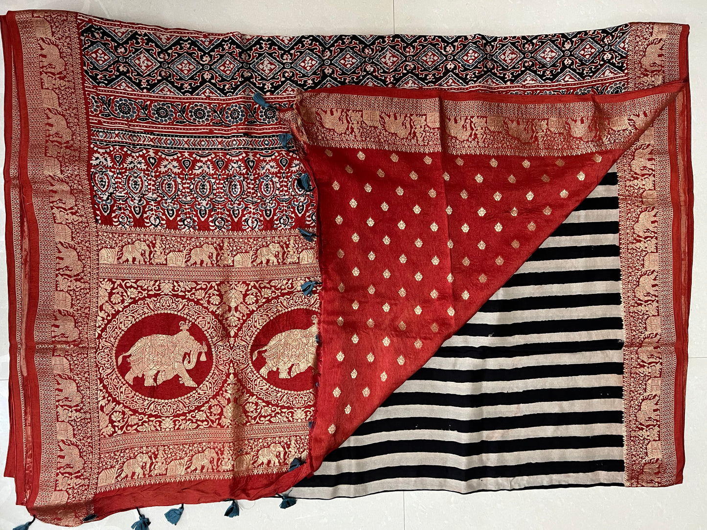 Ajrakh dola silk zari border saree