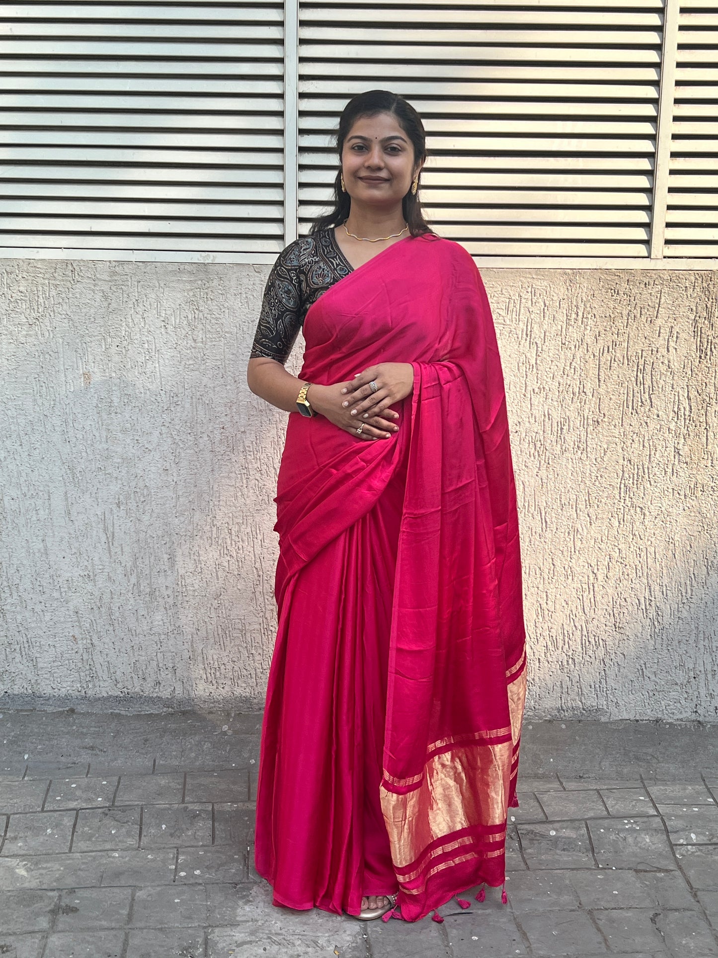 Pink plain modal silk saree with tissue border