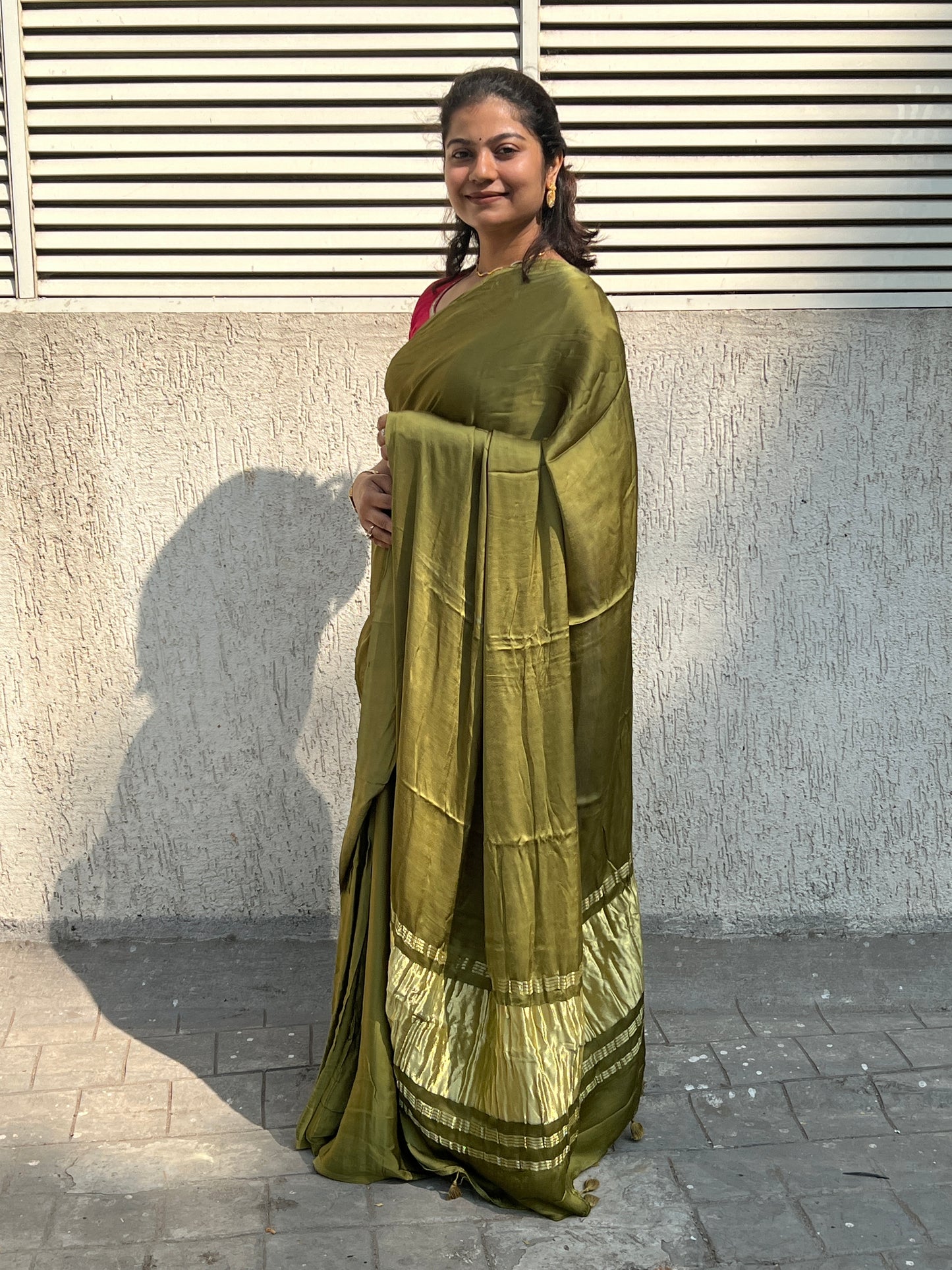 Mehendi plain modal silk saree with tissue border