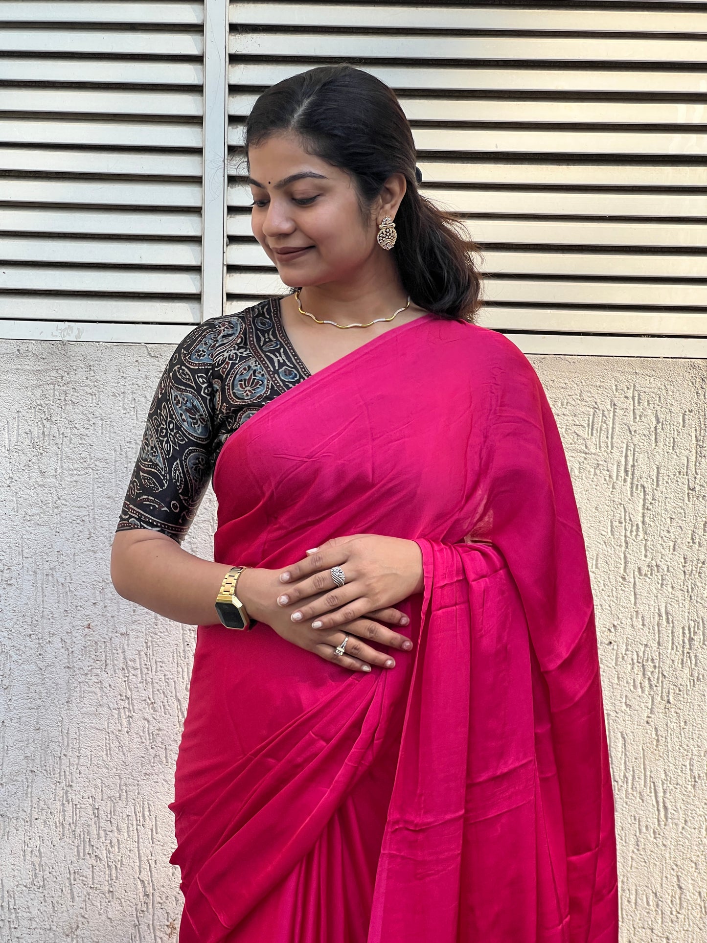 Pink plain modal silk saree with tissue border