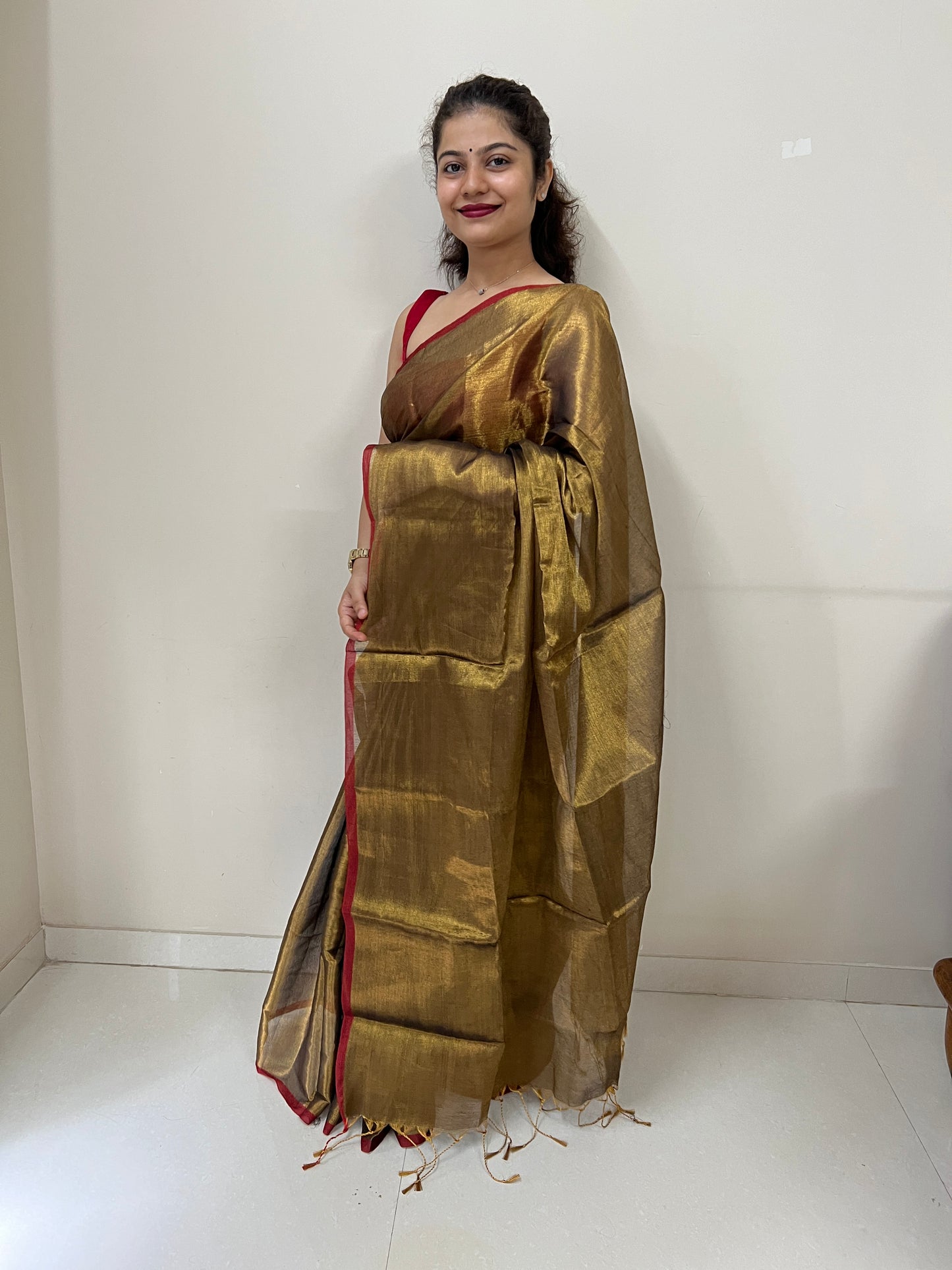 Gold mul cotton tissue saree