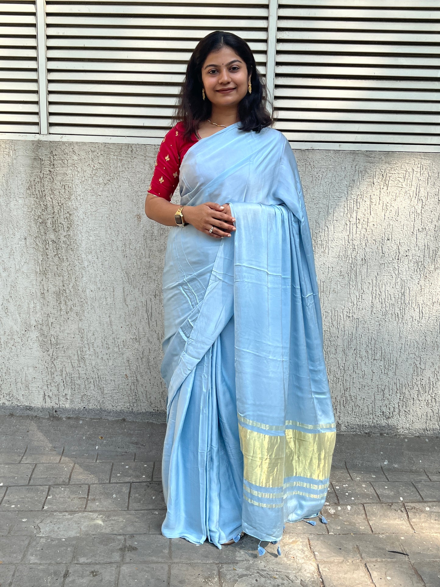 Sky plain modal silk saree with tissue border