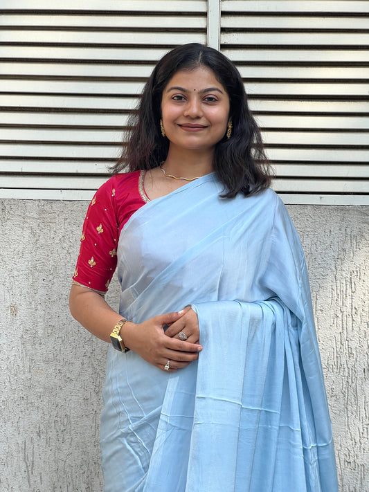 Sky plain modal silk saree with tissue border