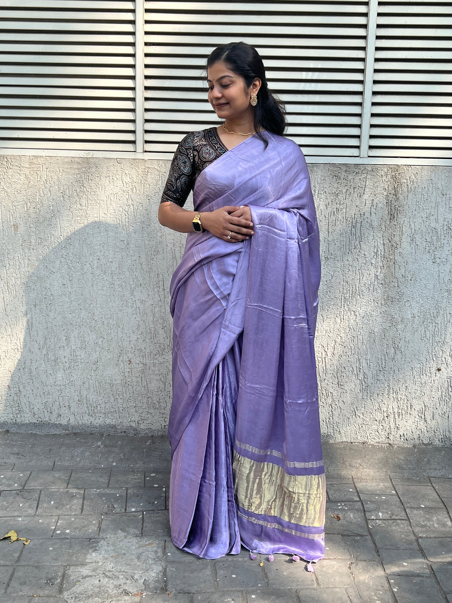 Lavender plain modal silk saree with tissue border